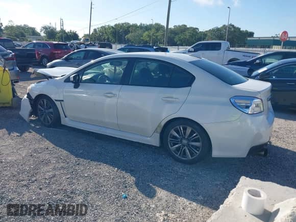2015 Subaru WRX with VIN JF1VA1A62F9812406, listed as a IAAI auction lot 42746561 with 143,009 mi miles and . Bid and sale history available at DreamBid. Image 3.