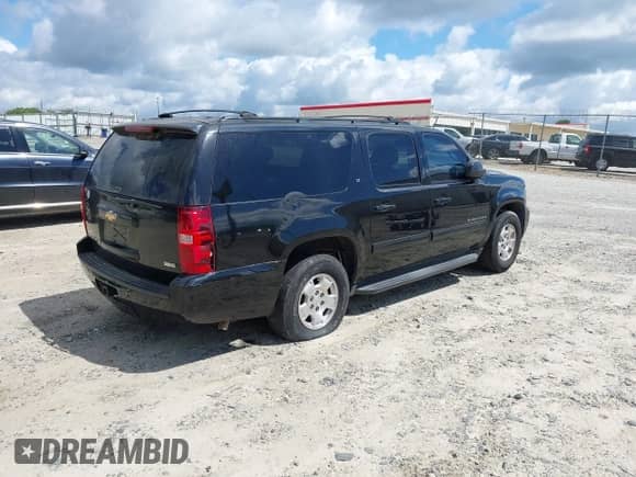 2010 Chevrolet Suburban LT z VIN 1GNUCJE08AR192831, wystawiony jako IAAI lot #42534754 z przebiegiem 165 741 mil mil oraz . Historia ofert i sprzedaży dostępna na DreamBid. Obrazek 4.