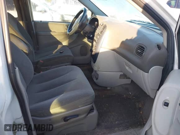 2005 Dodge Caravan SXT with VIN 1D4GP45R25B215239, listed as a IAAI auction lot 43505827 with 232,896 mi miles and . Bid and sale history available at DreamBid. Image 5.