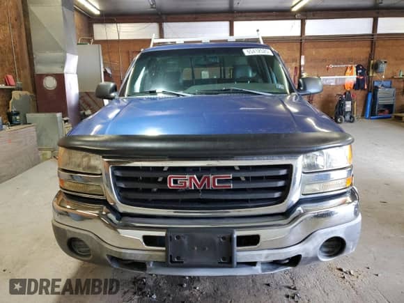 2003 GMC Sierra 1500 SLE z VIN 1GTEK14V33Z206988, wystawiony jako Copart lot #65412525 z przebiegiem 209 061 mil mil oraz Czysty tytuł • Clean title. Historia ofert i sprzedaży dostępna na DreamBid. Obrazek 5.
