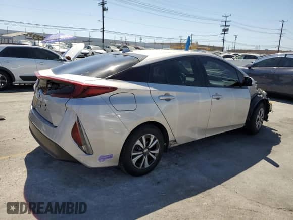 2018 Toyota Prius Plus z VIN JTDKARFP7J3099284, wystawiony jako Copart lot #58186915 z przebiegiem 51 694 mil mil oraz Szkoda całkowita • Salvage title. Historia ofert i sprzedaży dostępna na DreamBid. Obrazek 3.