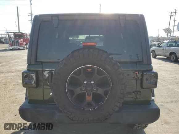 2022 Jeep Wrangler Unlimited Sport S с VIN 1C4HJXDG2NW196267, выставлен на аукционе Copart как лот 52739885 с пробегом 18 547 миль миль и Списание • Salvage title. История ставок и продаж доступна на DreamBid. Изображение 6.