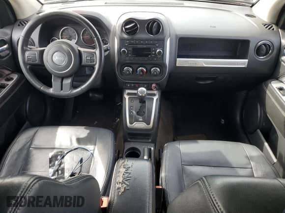 2014 Jeep Compass Latitude with VIN 1C4NJCEB1ED522330, listed as a Copart auction lot 84630415 with 150,480 mi miles and Salvage title. Bid and sale history available at DreamBid. Image 8.