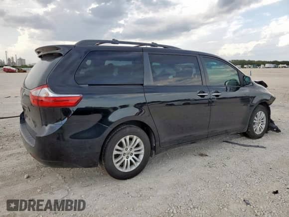 2015 Toyota Sienna XLE z VIN 5TDYK3DC1FS549649, wystawiony jako Copart lot #70762555 z przebiegiem 106 883 mil mil oraz Szkoda całkowita • Salvage title. Historia ofert i sprzedaży dostępna na DreamBid. Obrazek 3.