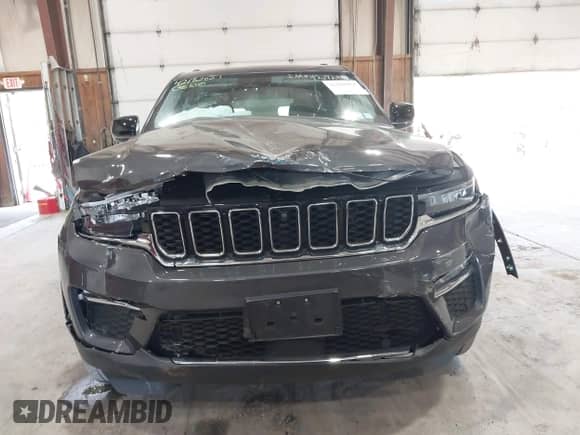 2022 Jeep Grand Cherokee with VIN 1C4RJYB65N8758560, listed as a IAAI auction lot 42182021 with 28,096 mi miles and . Bid and sale history available at DreamBid. Image 6.