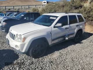 2005 Jeep Grand Cherokee Laredo z VIN 1J8HR48N55C593563, wystawiony jako Copart lot #67606965 z przebiegiem 191 493 mil mil oraz Szkoda całkowita • Salvage title. Historia ofert i sprzedaży dostępna na DreamBid. Obrazek 1.