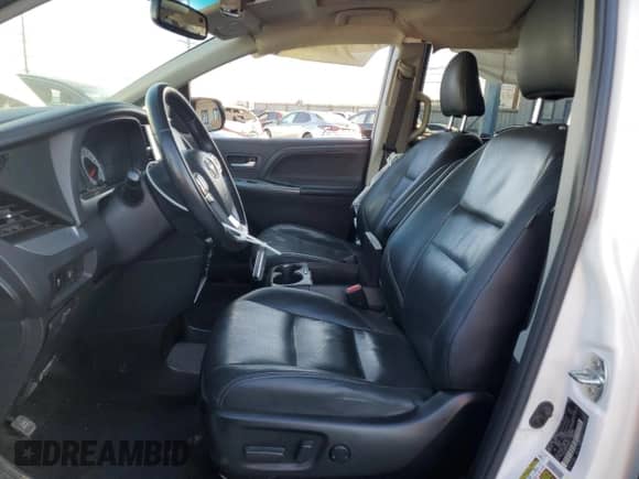 2015 Toyota Sienna SE with VIN 5TDXK3DC2FS604847, listed as a Copart auction lot 71674565 with 86,782 mi miles and Salvage title. Bid and sale history available at DreamBid. Image 7.