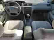 1999 Toyota Camry LE z VIN JT2BG22K4X0378940, wystawiony jako Copart lot #69477874 z przebiegiem 255 052 mil mil oraz Szkoda całkowita • Salvage title. Historia ofert i sprzedaży dostępna na DreamBid. Obrazek 8.