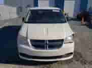 2013 Dodge Grand Caravan SE with VIN 2C4RDGBG1DR668450, listed as a Copart auction lot 84417195 with 189,536 mi miles and Salvage title. Bid and sale history available at DreamBid. Image 5.
