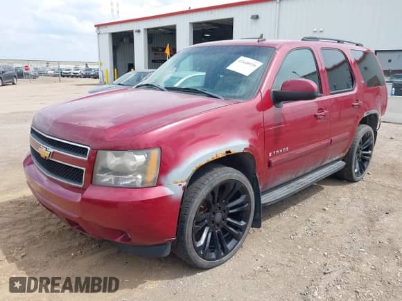 2007 Chevrolet Tahoe LS with VIN 1GNFK13067J102808, listed as a IAAI auction lot 42448920 with 36,159 mi miles and . Bid and sale history available at DreamBid. Image 2.