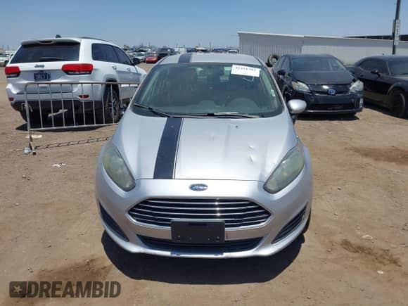 2018 Ford Fiesta S with VIN 3FADP4TJ3JM118671, listed as a IAAI auction lot 42451701 with 99,914 mi miles and . Bid and sale history available at DreamBid. Image 6.