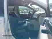 2020 Dodge Grand Caravan SXT with VIN 2C4RDGCGXLR178599, listed as a IAAI auction lot 43000006 with 83,147 mi miles and . Bid and sale history available at DreamBid. Image 5.