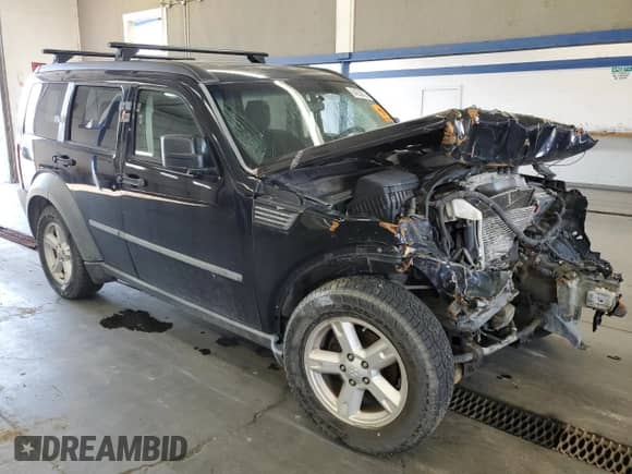 2007 Dodge Nitro SXT с VIN 1D8GU28K87W569479, выставлен на аукционе Copart как лот 84258725 с пробегом 161 315 миль миль и Списание • Salvage title. История ставок и продаж доступна на DreamBid. Изображение 4.
