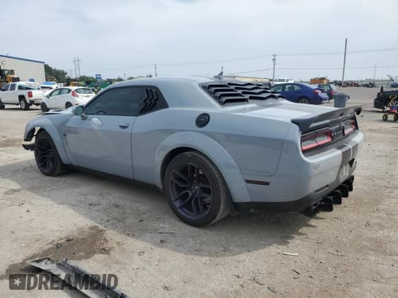 2021 Dodge Challenger R/T Scat Pack Widebody with VIN 2C3CDZFJ2MH503086, listed as a Copart auction lot 71727655 with 65,806 mi miles and Salvage title. Bid and sale history available at DreamBid. Image 2.