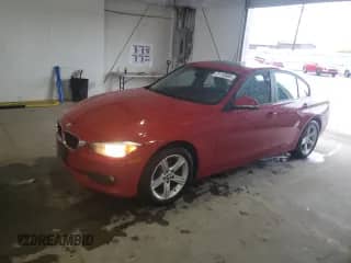 2015 BMW 3 Series 328i xDrive with VIN WBA3B3G52FNT17880, listed as a Copart auction lot 71110565 with 122,608 mi miles and Salvage title. Bid and sale history available at DreamBid. Image 1.