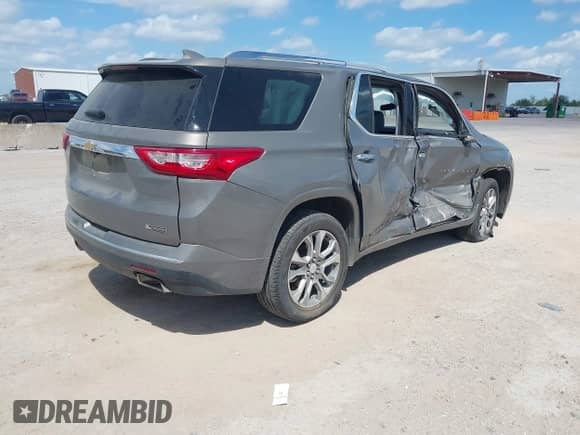 2018 Chevrolet Traverse Premier with VIN 1GNERKKW0JJ115063, listed as a IAAI auction lot 43278445 with 126,658 mi miles and . Bid and sale history available at DreamBid. Image 4.