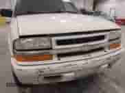 2002 Chevrolet Blazer LS z VIN 1GNDT13W02K237066, wystawiony jako IAAI lot #43275570 z przebiegiem 149 307 mil mil oraz . Historia ofert i sprzedaży dostępna na DreamBid. Obrazek 6.