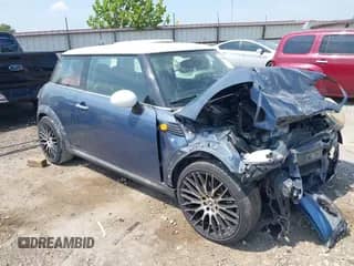 2010 MINI Hardtop with VIN WMWMF3C58ATZ64206, listed as a IAAI auction lot 43224847 with 121,463 mi miles and . Bid and sale history available at DreamBid. Image 1.