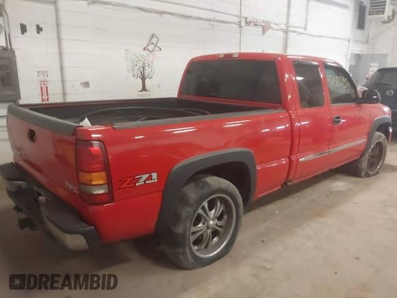 2003 GMC Sierra 1500 SLT z VIN 1GTEK19T63E280453, wystawiony jako IAAI lot #42565954 z przebiegiem 267 969 mil mil oraz . Historia ofert i sprzedaży dostępna na DreamBid. Obrazek 4.