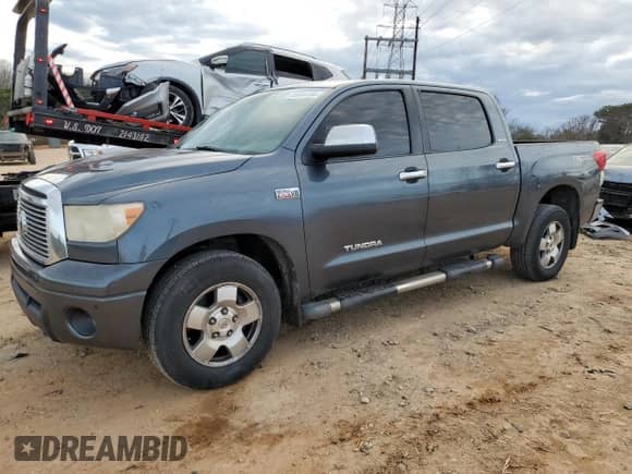 2010 Toyota Tundra Limited z VIN 5TFFY5F16AX089422, wystawiony jako Copart lot #85644454 z przebiegiem 322 973 mil mil oraz Czysty tytuł • Clean title. Historia ofert i sprzedaży dostępna na DreamBid. Obrazek 1.