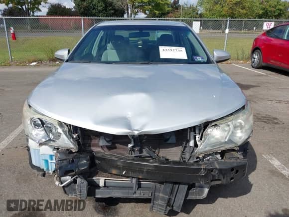 2014 Toyota Camry SE with VIN 4T1BF1FK1EU454680, listed as a IAAI auction lot 43392735 with 117,814 mi miles and . Bid and sale history available at DreamBid. Image 6.