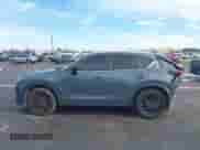 2022 Mazda CX-5 S Preferred z VIN JM3KFBCM3N0539261, wystawiony jako IAAI lot #43264779 z przebiegiem 60 847 mil mil oraz . Historia ofert i sprzedaży dostępna na DreamBid. Obrazek 14.