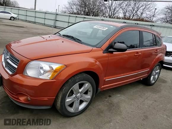 2011 Dodge Caliber Rush z VIN 1B3CB8HB8BD121545, wystawiony jako Copart lot #44566365 z przebiegiem 117 100 mil mil oraz Szkoda całkowita • Salvage title. Historia ofert i sprzedaży dostępna na DreamBid. Obrazek 11.