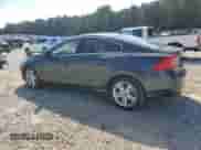2015 Volvo S60 T5 Drive-E Premier with VIN YV140MFK0F1352395, listed as a Copart auction lot 80151995 with 152,034 mi miles and Salvage title. Bid and sale history available at DreamBid. Image 2.