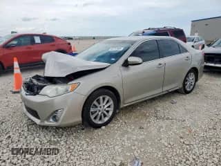 2013 Toyota Camry LE with VIN 4T1BD1FKXDU069056, listed as a Copart auction lot 70261715 with 170,259 mi miles and Salvage title. Bid and sale history available at DreamBid. Image 1.