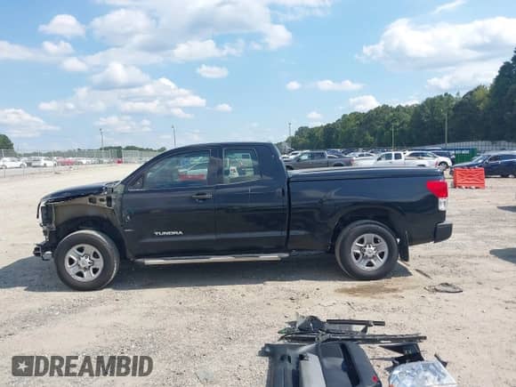 2012 Toyota Tundra z VIN 5TFRU5F11CX027728, wystawiony jako IAAI lot #43122765 z przebiegiem 196 119 mil mil oraz . Historia ofert i sprzedaży dostępna na DreamBid. Obrazek 15.