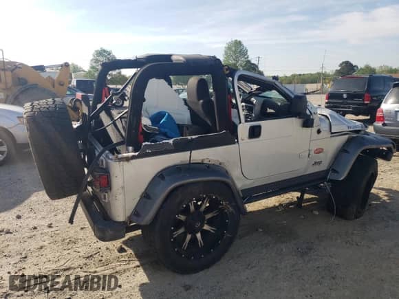 2003 Jeep Wrangler Rubicon с VIN 1J4FA69S53P375189, выставлен на аукционе Copart как лот 54292035 с пробегом 55 863 миль миль и Списание • Salvage title. История ставок и продаж доступна на DreamBid. Изображение 3.