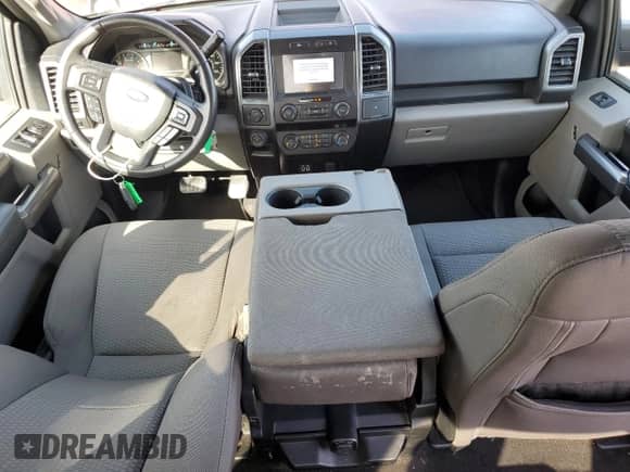 2020 Ford F-150 XL with VIN 1FTEW1C54LFC59884, listed as a Copart auction lot 54306665 with 52,223 mi miles and Salvage title. Bid and sale history available at DreamBid. Image 8.