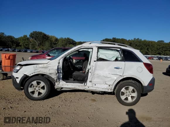 2013 Chevrolet Captiva Sport LS with VIN 3GNAL1EK1DS534268, listed as a Copart auction lot 70056984 with 98,034 mi miles and Salvage title. Bid and sale history available at DreamBid. Image 9.