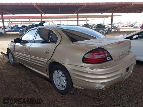 2001 Pontiac Grand Am SE z VIN 1G2NE52T81M582634, wystawiony jako IAAI lot #42652160 z przebiegiem Nie podano mil oraz . Historia ofert i sprzedaży dostępna na DreamBid. Obrazek 3.