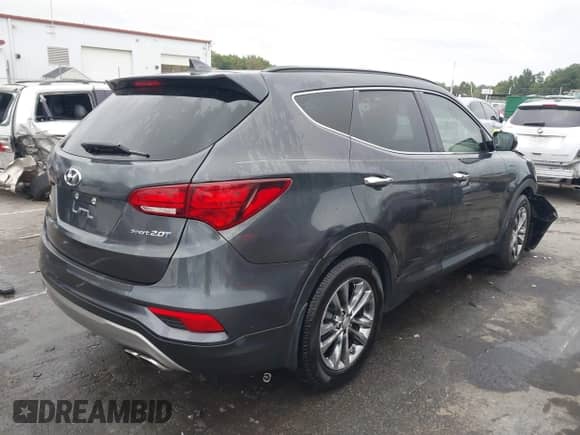 2018 Hyundai Santa Fe 2.0T with VIN 5XYZU4LA1JG529573, listed as a IAAI auction lot 43307903 with 83,585 mi miles and . Bid and sale history available at DreamBid. Image 4.