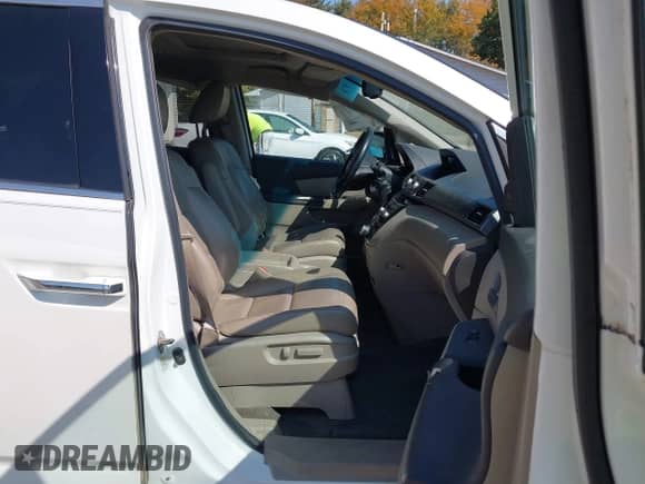 2012 Honda Odyssey Touring with VIN 5FNRL5H9XCB145597, listed as a IAAI auction lot 43247934 with 257,447 mi miles and . Bid and sale history available at DreamBid. Image 5.