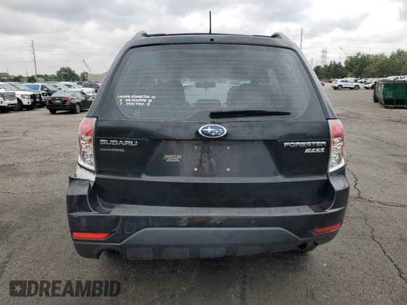 2013 Subaru Forester X z VIN JF2SHABC9DG403830, wystawiony jako Copart lot #66901685 z przebiegiem 183 552 mil mil oraz Szkoda całkowita • Salvage title. Historia ofert i sprzedaży dostępna na DreamBid. Obrazek 6.
