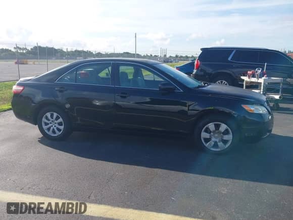 2007 Toyota Camry CE with VIN 4T1BE46K77U140099, listed as a IAAI auction lot 43384538 with 147,954 mi miles and . Bid and sale history available at DreamBid. Image 13.