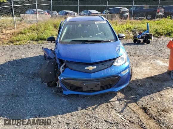 2017 Chevrolet Bolt EV Premier с VIN 1G1FX6S07H4181763, выставлен на аукционе Copart как лот 71482825 с пробегом 53 109 миль миль и Списание • Salvage title. История ставок и продаж доступна на DreamBid. Изображение 5.