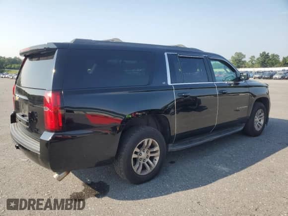 2019 Chevrolet Suburban LT with VIN 1GNSKHKCXKR157646, listed as a Copart auction lot 66486525 with 136,121 mi miles and Salvage title. Bid and sale history available at DreamBid. Image 3.