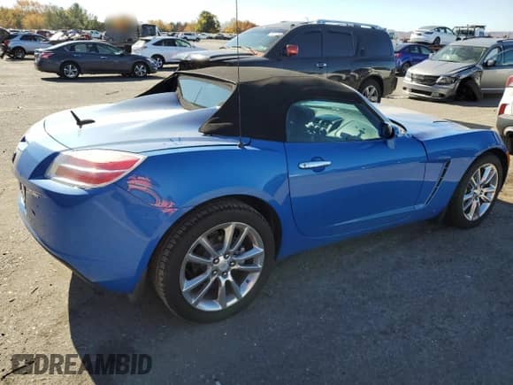 2009 Saturn Sky with VIN 1G8ML35X09Y107848, listed as a Copart auction lot 77030984 with 45,364 mi miles and Salvage title. Bid and sale history available at DreamBid. Image 3.