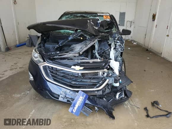 2020 Chevrolet Equinox LT с VIN 3GNAXKEV5LS656568, выставлен на аукционе Copart как лот 84374105 с пробегом 104 988 миль миль и Списание • Salvage title. История ставок и продаж доступна на DreamBid. Изображение 5.