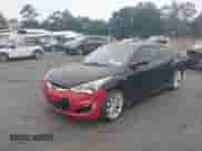 2012 Hyundai Veloster w/Black Int с VIN KMHTC6ADXCU035095, выставлен на аукционе IAAI как лот 43573317 с пробегом 139 502 миль миль и . История ставок и продаж доступна на DreamBid. Изображение 6.