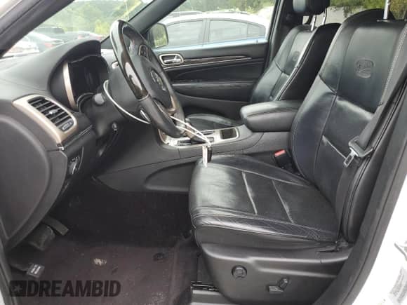 2017 Jeep Grand Cherokee Overland with VIN 1C4RJECG1HC773855, listed as a Copart auction lot 70180755 with 123,525 mi miles and Salvage title. Bid and sale history available at DreamBid. Image 7.