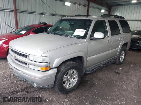 2005 Chevrolet Tahoe Z71 z VIN 1GNEK13T65R180512, wystawiony jako IAAI lot #42909906 z przebiegiem 194 340 mil mil oraz . Historia ofert i sprzedaży dostępna na DreamBid. Obrazek 2.