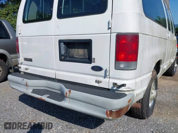 2002 Ford Econoline Cargo with VIN 1FTNE242X2HA90857, listed as a IAAI auction lot 42716391 with 103,796 mi miles and . Bid and sale history available at DreamBid. Image 13.