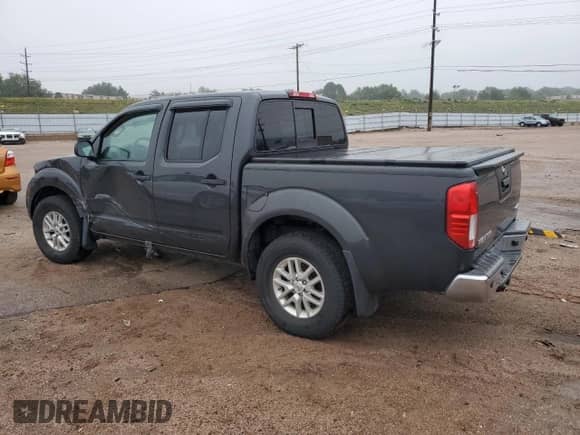 2015 Nissan Frontier SV with VIN 1N6AD0EV2FN737559, listed as a Copart auction lot 70682185 with 87,616 mi miles and Salvage title. Bid and sale history available at DreamBid. Image 2.