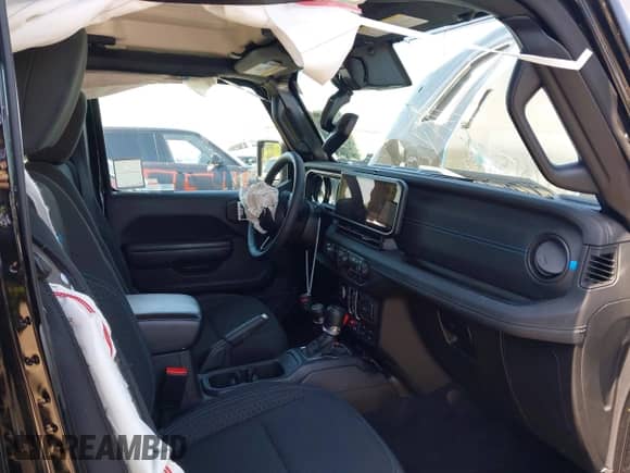 2024 Jeep Wrangler Rubicon с VIN 1C4RJXR63RW167211, выставлен на аукционе IAAI как лот 42306238 с пробегом 14 770 миль миль и . История ставок и продаж доступна на DreamBid. Изображение 5.