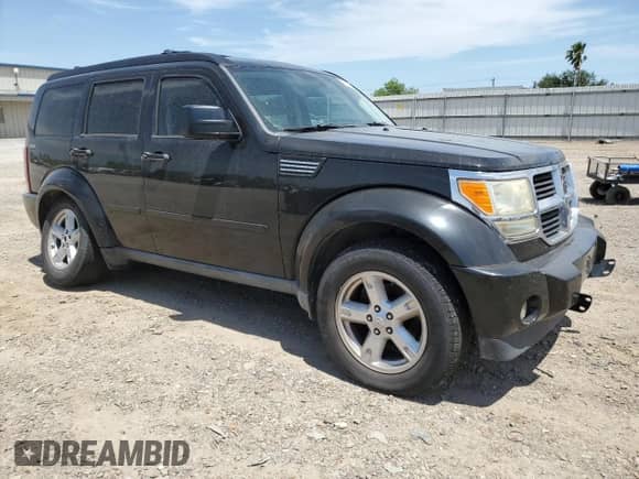 2009 Dodge Nitro SXT с VIN 1D8GU28KX9W542982, выставлен на аукционе Copart как лот 50878304 с пробегом 137 893 миль миль и Списание • Salvage title. История ставок и продаж доступна на DreamBid. Изображение 4.