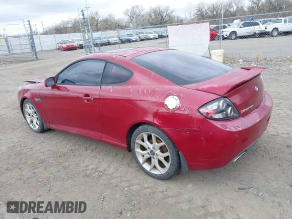 2007 Hyundai Tiburon GT с VIN KMHHN66F67U251509, выставлен на аукционе IAAI как лот 42115300 с пробегом 180 334 миль миль и . История ставок и продаж доступна на DreamBid. Изображение 3.